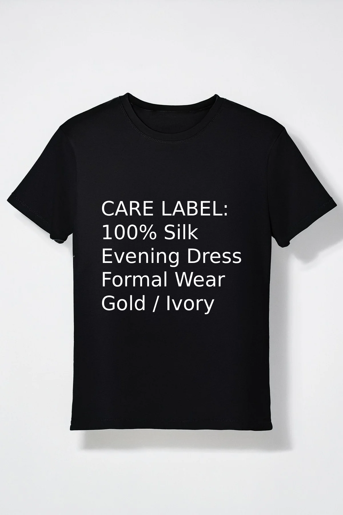 Black t-shirt with care label text: 100% Silk, Evening Dress, Formal Wear, Gold/Ivory - AI misclassification test