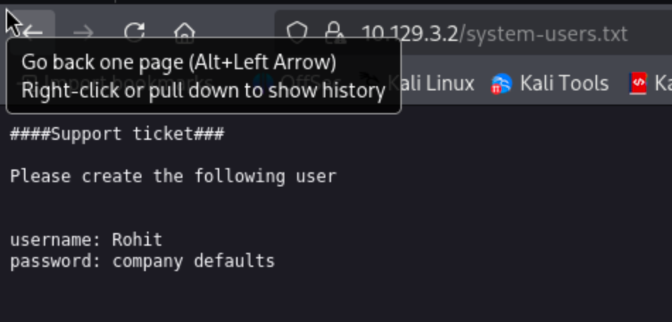 Browser showing content of https://10.129.3.2/system-users.txt with support ticket containing username Rohit and password as company defaults.